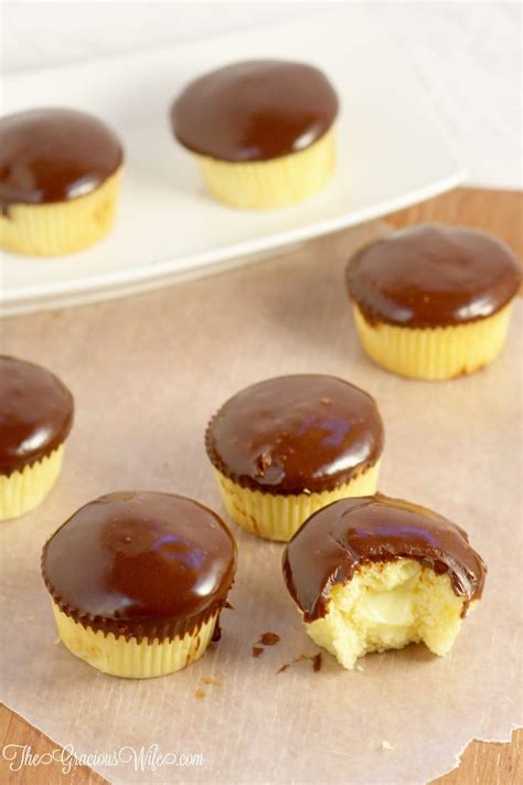 Spoon the cupcake batter into the cupcake liners, filling them half full. Boston Cream Pie Cupcakes | The Gracious Wife