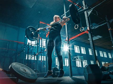 Fit Young Woman Lifting Barbells Working Out In A Gym Stock Image Image Of Fitness Beautiful