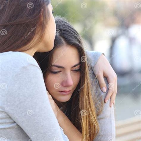 Sad Girl Crying And A Friend Comforting Her Stock Image Image Of