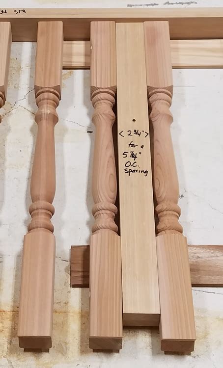 Many installers simply place the metal balusters 4 inches on center and don't try and push it by accounting for the thickness of the baluster. spindle spacing - American Porch, LLC.
