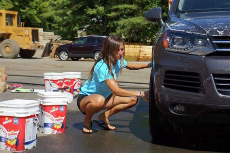 Tackling Grime Staples Cheerleaders Make Splash At Car Wash
