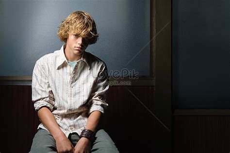 Teenage Boy Sitting Alone Picture And Hd Photos Free Download On Lovepik