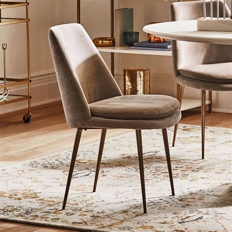 Their upholstery can range anywhere from linen to leather. Finley Low-Back Upholstered Dining Chair | west elm United ...