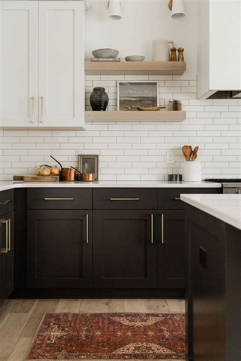You can also cover the exposed cabinet face frames with matching wood or plastic veneer and then paint the cabinets. Modern black cabinets in tuxedo kitchen in 2020 | Kitchen, Black kitchen cabinets, Kitchen space