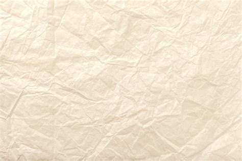 Premium Photo Texture Of Crumpled Light Beige Wrapping Paper