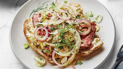 Steak sandwiches are sometimes served with toppings of cheese, onions, mushrooms, peppers, tomatoes. Steak Sandwiches with Fennel Slaw Recipe | Bon Appétit