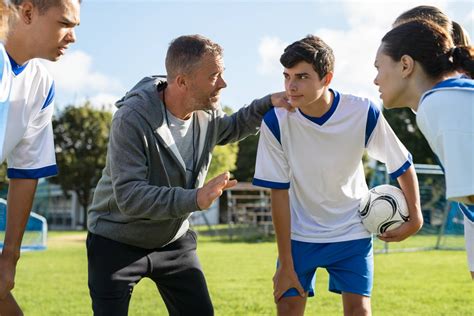 Coach Talking To Young Soccer Team Before The Matc 2022 02 02 03 59 12