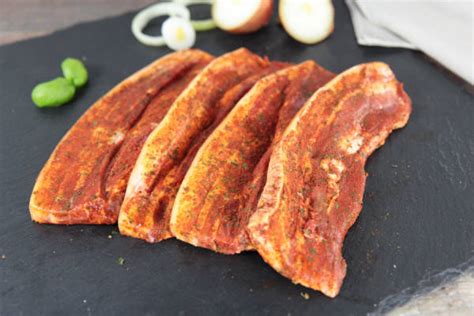 Assaisonner la viande de porc à l'ail et. Poitrine de porc à la mexicaine est un produit livré à domicile