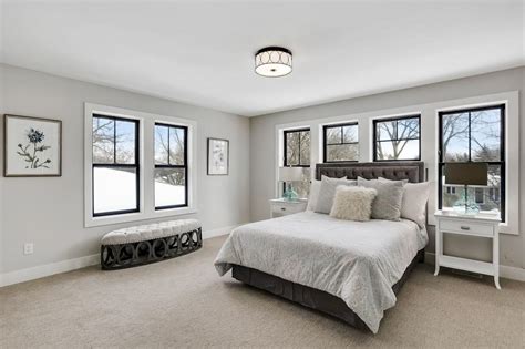 Traditional Neutral Bedroom Featuring Multiple Paned Windows Hgtv