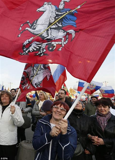 vladimir putin addresses 100 000 supporters marking one year since russia seized crimea daily