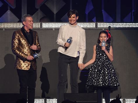 Katie Holmes And Suri Cruise Make Surprise Appearance Onstage At Jingle Ball Access