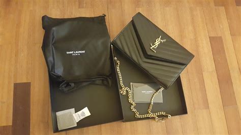Saint laurent is one of the most recognisable luxury labels in the world and is instantly evoked with the edit of ysl bags from farfetch. ysl wallet on a chain, y purses