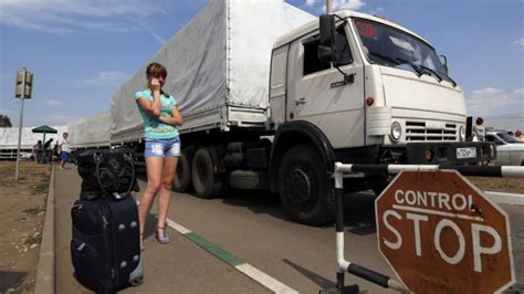 Ukraine Claims Direct Invasion After Russian Convoy Crosses Border