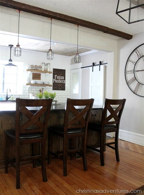 The kitchen island in an old hardware store counter that i had a galvanized steel top made for. Industrial Farmhouse Kitchen (style trend)