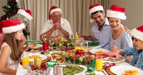 Kids sitting at christmas table with father. Happy Extended Family At The Christmas Dinner Table At Home In The Dining Room Stock Footage ...