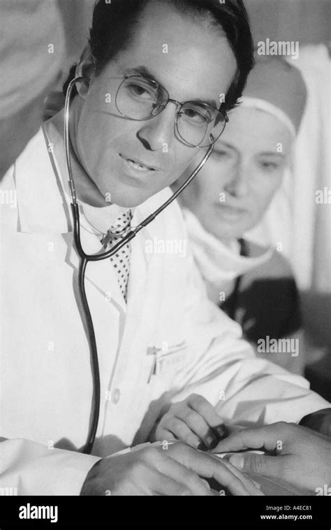 Doctor Treating Patient In The Emergency Room Stock Photo Alamy