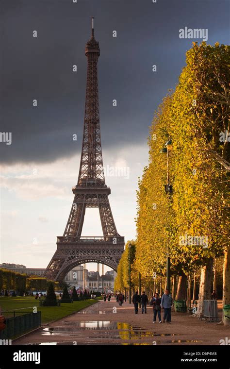 The Eiffel Tower From Champ De Mars Paris France Europe Stock Photo
