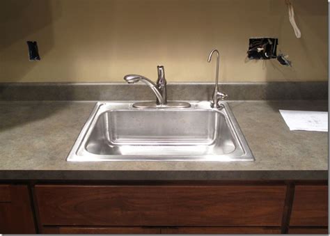 When you install the sink faucet, you connect it to the valves with. The "L" Shaped House: Plumbing…Day 18