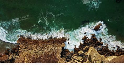 Aerial View From Drone Of Ocean Waves On Rocky Beach Stock Video Footage 11361320
