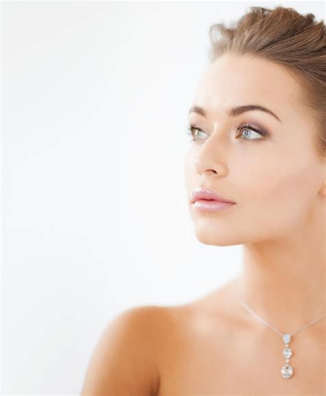 Premium Photo Close Up Of Beautiful Woman Wearing Shiny Diamond Necklace