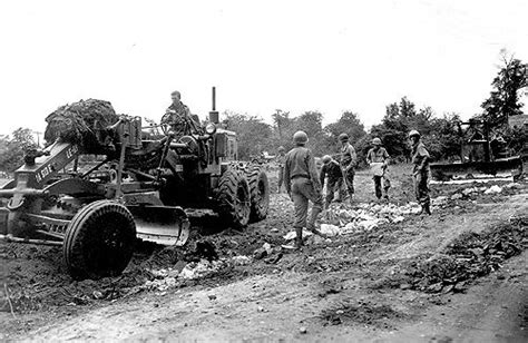 300th Combat Engineers Co C Constructing A By Pass Between Carentan