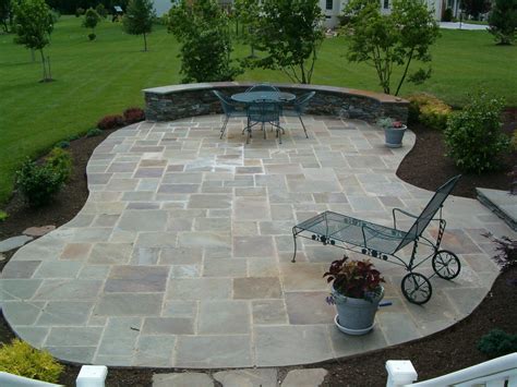 Once you've removed the topsoil, add a base layer of gravel and compact it. Do It Yourself Patio Design Ideas and Features - DIY Ideas
