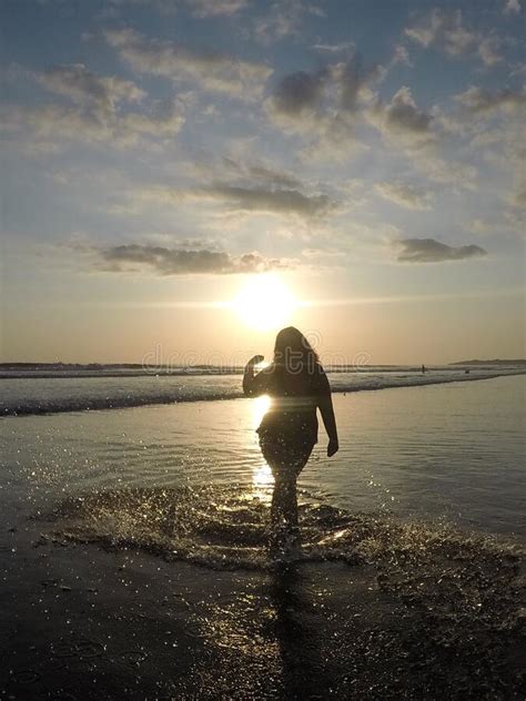 Curvy Female In The Sunset On The Beach Stock Image Image Of Spashing Strong 176846871