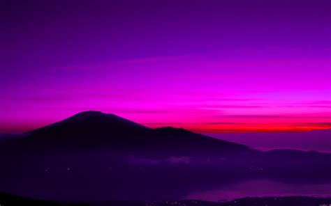 Download Purple Sunset Behind Mountain Wallpaper