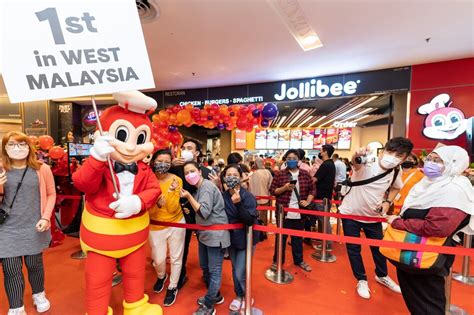 Jollibee Says Hundreds Queued At First Malaysian Store Abs Cbn News