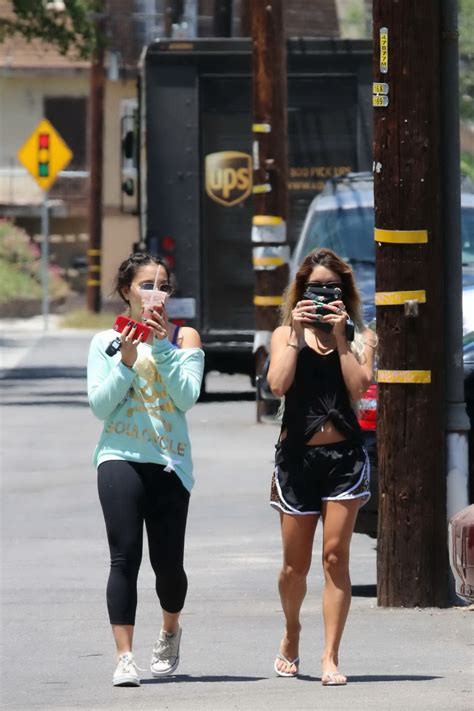 Vanessa Hudgens Seethrough To Bra And Leggy With Her Sister Out In