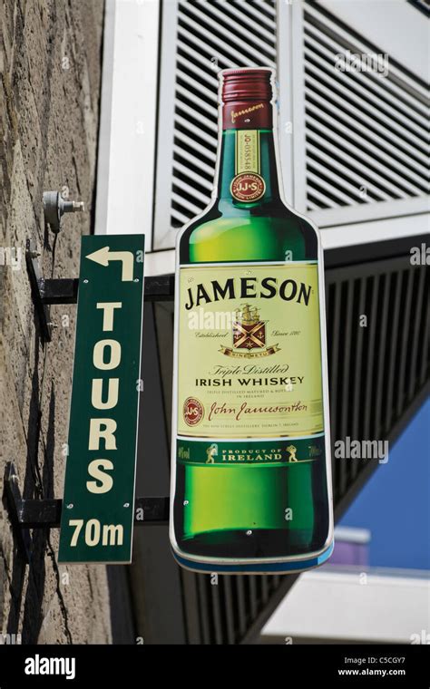 Sign A Bottle Of Jamesons Irish Whiskey As A Direction Sign To The