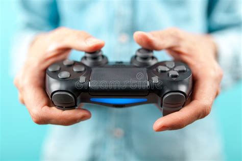 Male Hands Holding A Gaming Controller Stock Image Image Of Hand
