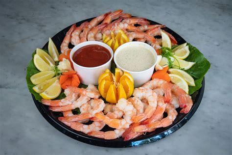 Learn how to cook the shrimp and assemble it here. Cocktail Shrimp Platter - Sea Breeze Fish Market & Grill