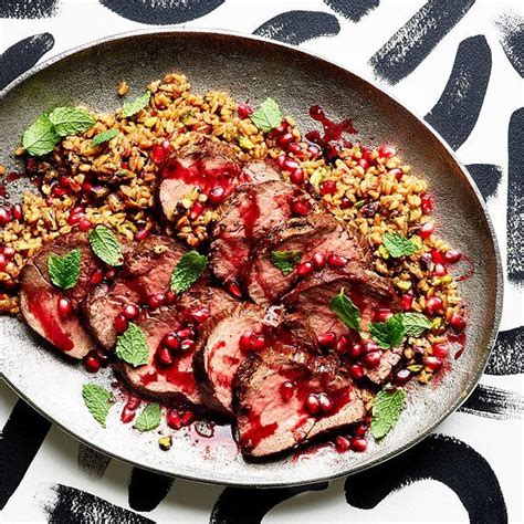 Tender and juicy beef tenderloin roast made with a simple garlic marinade and baked in the oven to perfection. Beef Tenderloin with Pomegranate Sauce & Farro Pilaf in 2020 | Pomegranate sauce, Beef ...