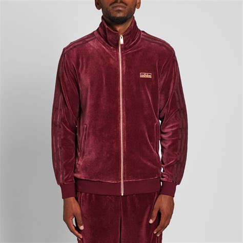 For the upper body, adidas originals jackets help you layer up and stay warm while you're training outside. Adidas Velour Beckenbauer Track Top (Maroon)