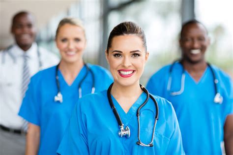 Medical Nurse And Colleagues Stock Photo Download Image