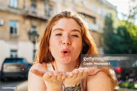 Redhead Blowing Kiss Photos And Premium High Res Pictures Getty Images