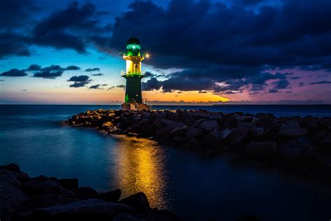 Lighthouse At Night Wallpaper