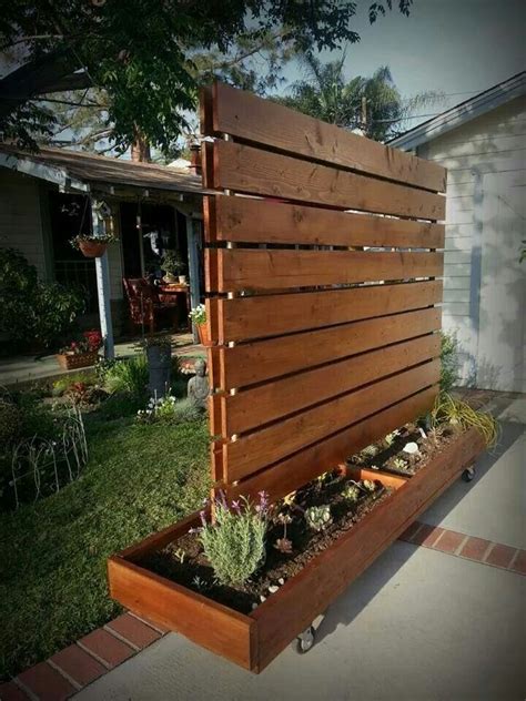 Build a fence without either planning committee or city approval and you risk having to tear it down and rebuild it. Moveable privacy fence/succulent garden made from a rolling garment rack | Privacy fence designs ...