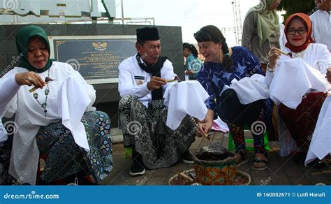 A Group Of People Doing Batik In A Park Editorial Photo Image Of