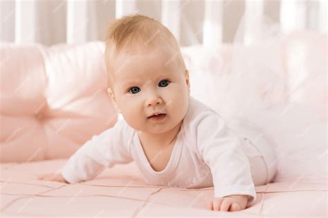 Premium Photo Portrait Of A Cute 6 Month Old Baby A Newborn Girl