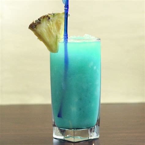 Teal Squeal drink recipe: Vodka, Blue Curacao, Pineapple | Teal punch ...