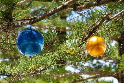 Image Of Giant Christmas Baubles And Decorations On Tree Austockphoto