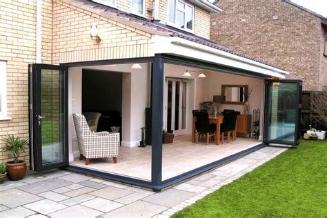 Andin modern large rooms two panels will not be sufficient to have the room opened up. Smarts Visofold 1000 Aluminium Bi Fold Doors | Garden room ...