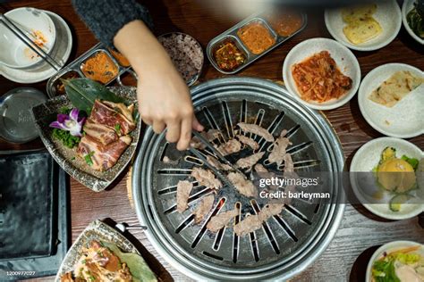 Korean Barbecue And Side Dishes South Korea High Res Stock Photo