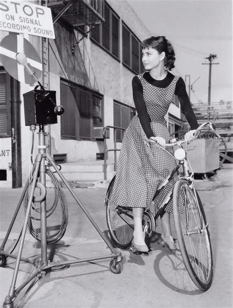 Audrey Hepburn Stops Her Bike
