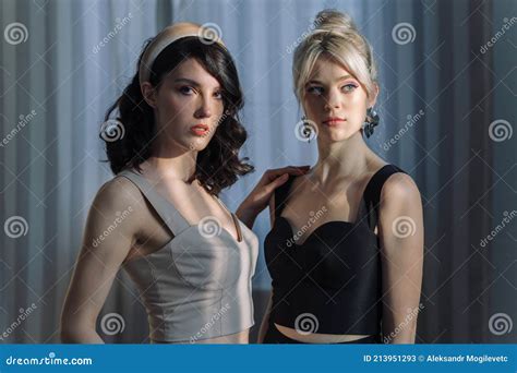 Studio Portrait Blondes And Brunettes Blue Eyes Young And Tender