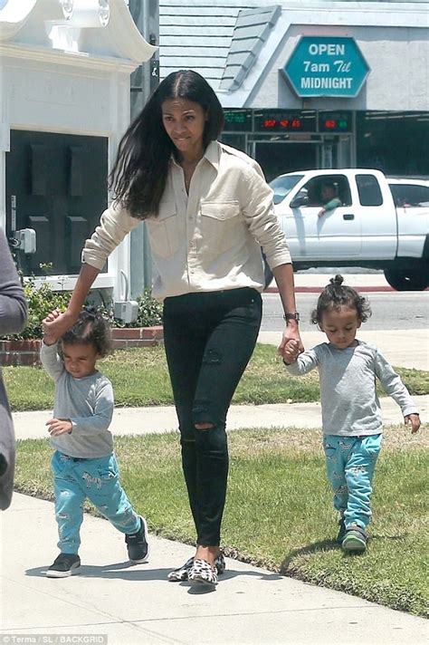 zoe saldana enjoys stroll with twin sons cy and bowie daily mail online