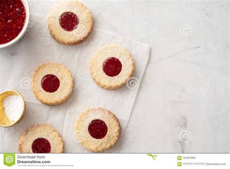 The famous austrian linzer cookies (linzerkekse) with step by step photos. Christmas Cookies. Linzer Cookies With Raspberry Jam On ...