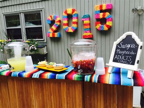This post is about a taco themed graduation party. Fiesta Themed Graduation Party / 6 Tips For A Fiesta Themed Graduation Party Giggles Galore ...